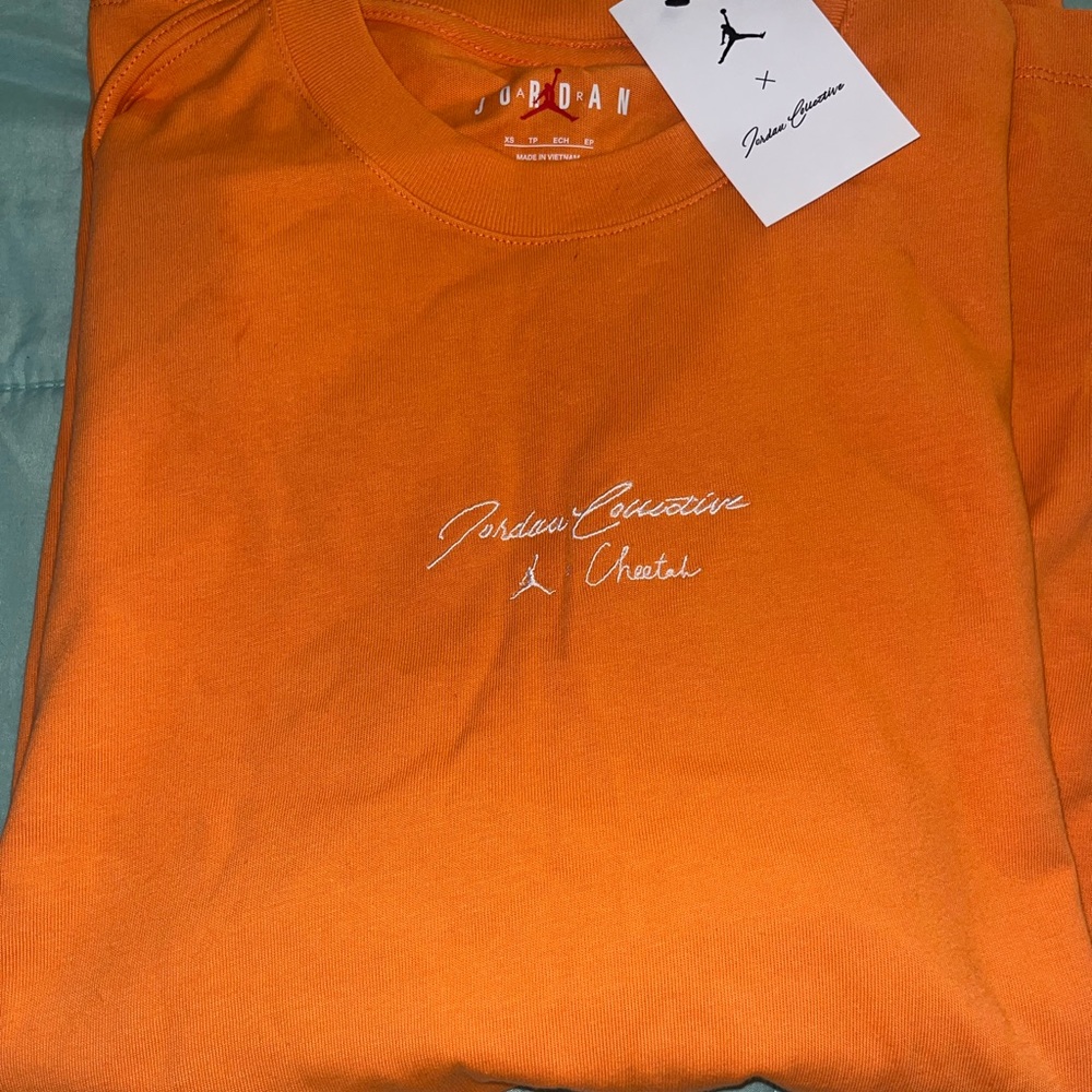 Orange over sized Jordan shirt